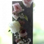 Taartversiering | Een slinger van bloemen voor op de bruidstaart